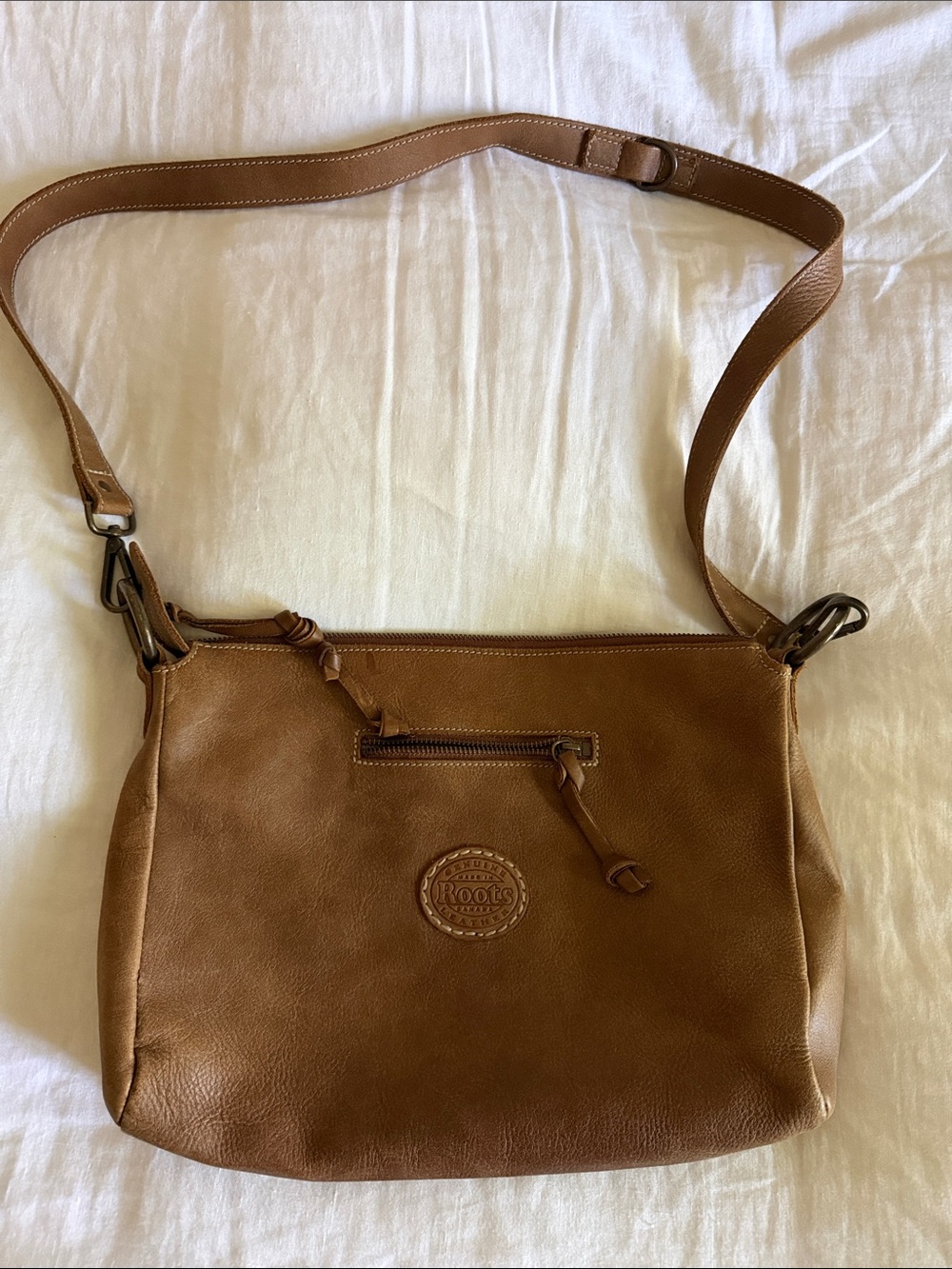 ROOTS purse